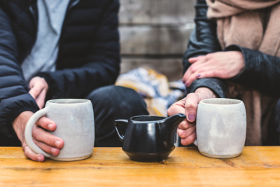 Image: People socializing over a cup of coffee